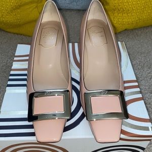 Roger Vivier Metal Buckle Pumps in Patent Leather.